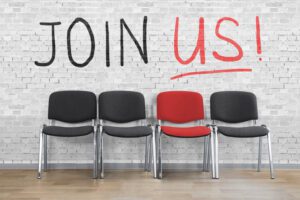 Businessman Yawning While Sitting On Chair