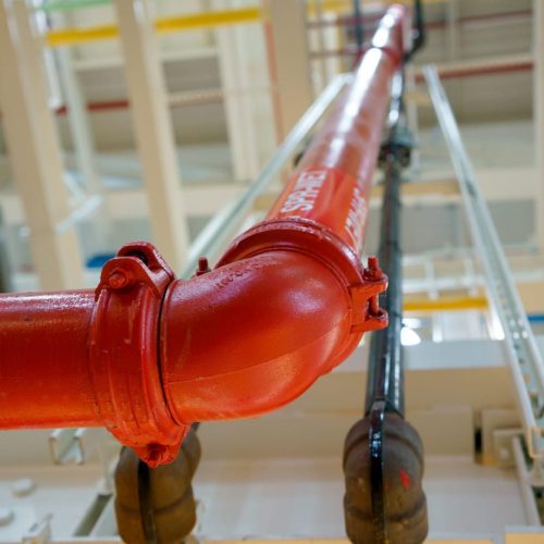Wet riser firefighting system installed in multi-storey building by EA-RS